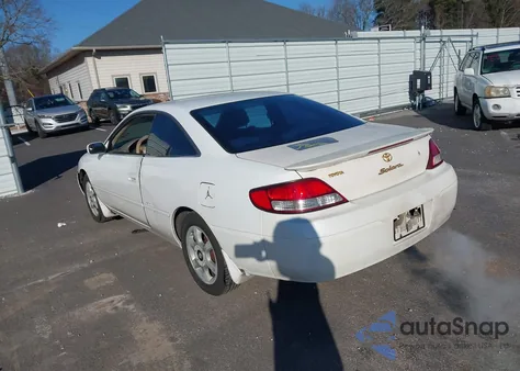 1999 Toyota Camry Solara Sle z USA, uszkodzony, nr VIN 2T1CF22P4XC160724